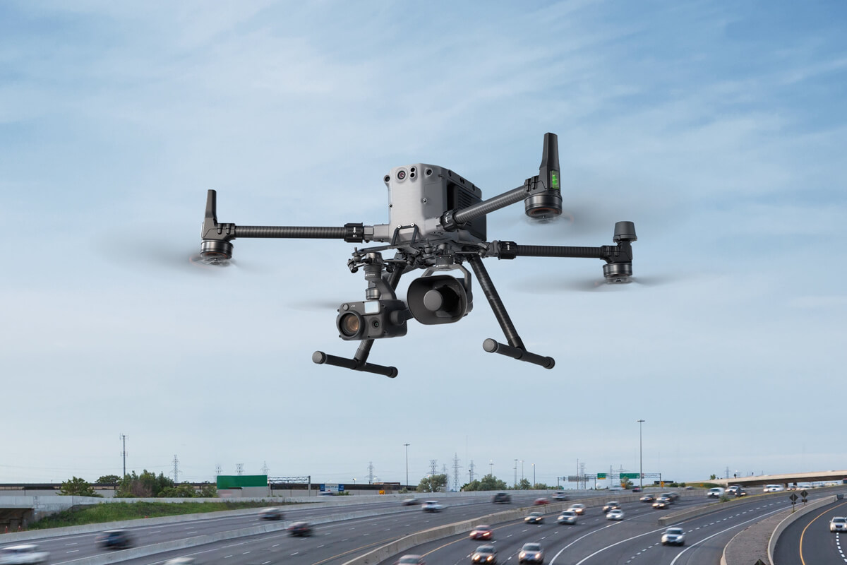 DJI Zenmuse V1 speaker mounted on Matrice drone in flight