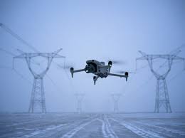 DJI enterprise drone inspecting powerlines for utility infrastructure